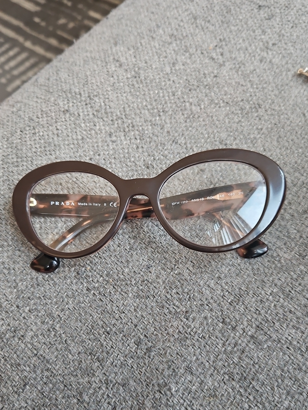 Prada Brown Oval Women's Optical Glasses - Sleek Designer Frame
